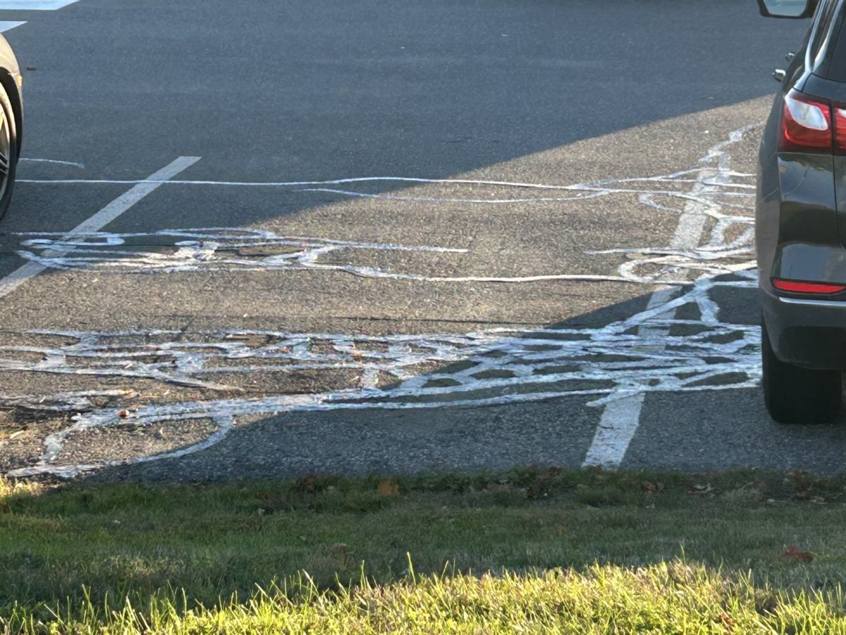 Crack sealing in a commercial parking lot in Southern Maine